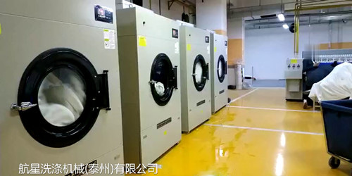 【視頻】酒店賓館洗衣房設備現(xiàn)場，工業(yè)布草烘干機設備